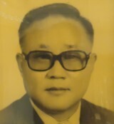 第六任校長 何維孝先生圖片